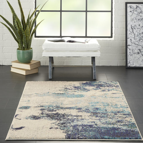 2' X 4' Ivory And Teal Blue Abstract Power Loom Non Skid Area Rug